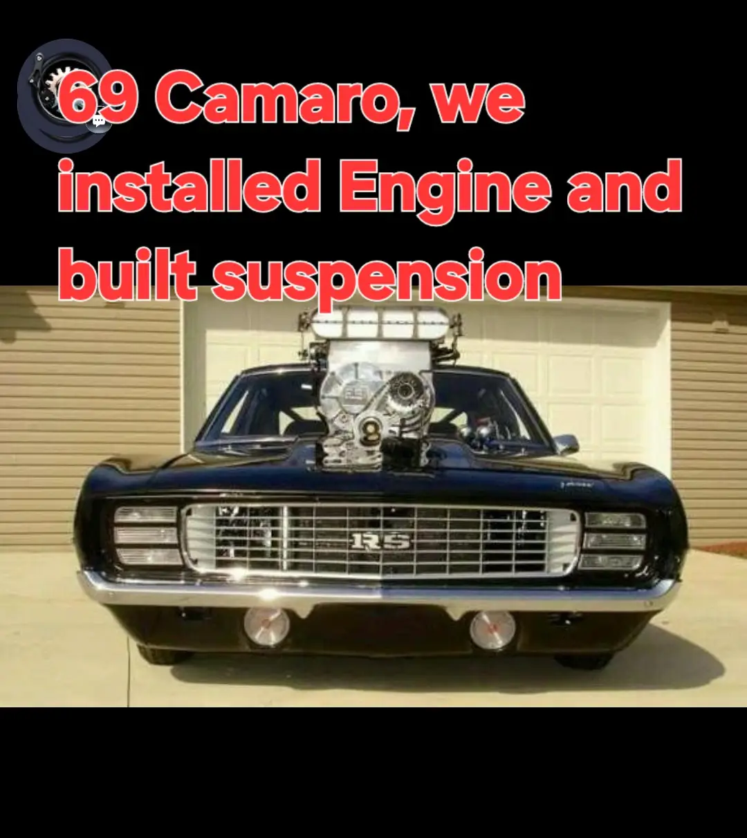 A black car with a large engine on the front.